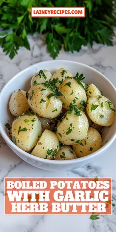 boiled potatoes with garlic and herb butter in a white bowl on a marble countertop