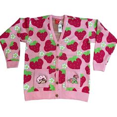 This Strawberry Shortcake Cardigan Is A Must-Have For Any Fan Of The Classic Character. The Allover Print Of Strawberries Adds A Colorful And Bohemian Touch To The Lightweight Knit Sweater, Which Features A V-Neckline, Long Sleeves, And Button Accents. It's Made Of A Blend Of Polyester And Viscose, And Is Machine Washable For Easy Care. Perfect For All Seasons, This Collared Cardigan In Pink Is Available In Size L. Get Ready To Show Off Your Love For Strawberry Shortcake In Style! Mansion Outfit, Strawberry Mansion, Collared Cardigan, Cardigan Pink, Printed Cardigan, Strawberry Shortcake, Lightweight Knit, All Seasons, Strawberries