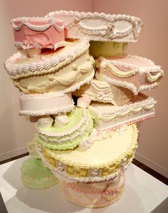 there are many different cakes stacked on top of each other