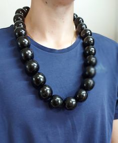 "Black statement wooden necklace for men Diameter a wooden bead - 1.48 inch (3cm) The beads are made from solid wood. Therefore, the necklace is quite heavy. The weight of a 30 inch necklace is 270 grams. The beads are strung on a strong nylon cord (not elastic). The mannequin is wearing a 30\" necklace. If there is no length you need in the selection list - let me know and I will make a desired length for you. If you have any questions, please contact me! *Back to my shop https://www.etsy.com/shop/IrinaJewelryBox?ref=hdr Thank you for visit." Necklace For Him, Large Bead Necklace, Necklace Big, Black Neck, Wood Bead Necklace, Wooden Necklace, Ball Necklace, Necklace For Men, Necklace Statement