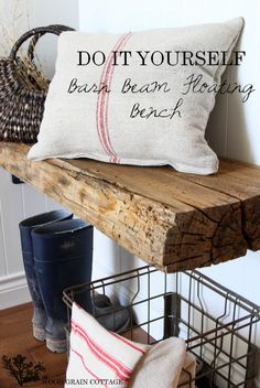 a wooden bench with two pillows on it and some baskets in the corner next to it