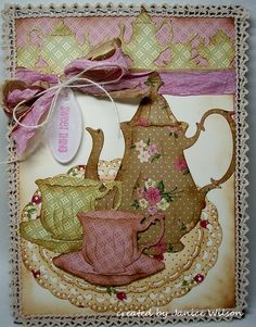 a card with a teapot and cup on it