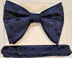 Large and luxurious, our men's long satin bow tie makes a statement without being over the top. This beautiful bow tie adds style and class to your formalwear simply and easily. The rich and elegant microfiber material instantly elevates your look from basic man to a dapper gentleman. This long bow tie is the perfect choice for your wedding day, prom, or any other formal occasion. It sets you apart from those around you for all the right reasons. This gorgeous microfiber butterfly is expertly cr Mens Bowtie, Groomsmen Gift Set, Long Bow, Bowtie And Suspenders, Suspenders Set, Silk Bow Ties, Dapper Gentleman, Pre Tied Bow Tie, Bow Tie Set