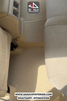 the interior of a car with white carpet