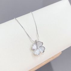 Material: Titanium Steel Fashion Element: Three-Petal Grass Style: Natural Silver Alloy Necklace With Flower Pendant, Silver Alloy Flower Pendant Necklace, White Leaf-shaped Jewelry Gift, Silver Leaf-shaped Necklace, Leaf-shaped Metal Jewelry Gift, Metal Leaf-shaped Jewelry For Gifts, Metal Leaf-shaped Jewelry Gift, Green Opal, Floral Necklace