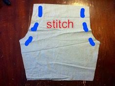 a piece of paper that has the word stitch written on it and blue tape around it