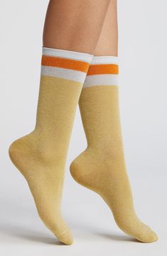 Shimmer from day to night in soft metallic-knit socks topped by sporty contrast stripes. 80% cotton, 10% Chinlon nylon, 10% spandex Machine wash, line dry Imported Metallic Knit, Day To Night, To Night, Knit Socks, Night In, Knitting Socks, High Heel, High Heels, Socks