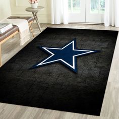 a large rug with a blue star on it