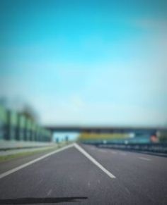 a blurry photo of an empty highway