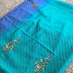 Gorgeous Ombr Colored Sari! Light Weight And Easy To Wear But Simple, Classic Embroidery. Comes With 2 Different Blouses As Well So Can Be Styled In Whichever Way You Choose. Brand New With Tags! Semi-stitched Embellished Blue Blouse Piece, Semi-stitched Embellished Blue Saree, Blue Bollywood Blouse For Formal Occasions, Blue Bollywood Style Formal Blouse Piece, Blue Bollywood Formal Blouse Piece, Embellished Blue Saree For Diwali, Blue Embellished Saree For Festivals, Blue Embellished Saree For Eid, Festive Blue Embellished Saree