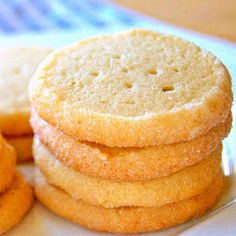 a stack of cookies sitting on top of a white plate