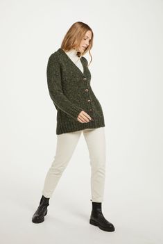 Relaxed, warming and crafted with passion. The Bonny Glen Tweed Cardigan takes the craftsmanship of Aran knitwear and blends it with the contemporary cut of modern fashion. Made with luxurious 100% Donegal Tweed, this piece is designed to champion the skill and mastery of our makers. With five beautifully finished buttons and perfectly crafted pockets on each side, this cardigan will see you through every season with ease. Stay cosy during cold winter nights or take it with you on a fresh spring Fitted Chunky Knit Wool Outerwear, Classic Wool Chunky Knit Cardigan, Wool Chunky Knit Cardigan For Work, Chunky Knit Wool Cardigan For Work, Winter Tweed Cardigan For Work, Winter Workwear Tweed Cardigan, Long Sleeve Tweed Cardigan For Winter, Grandfather Shirts, Tweed Cardigan