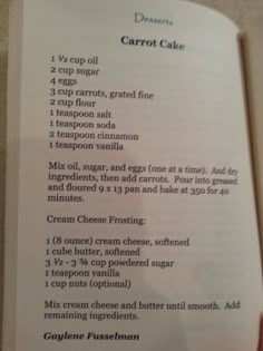 an open book with instructions on how to make carrot cake