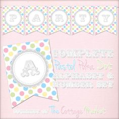 a baby shower banner with polka dots and the letter a on it's side