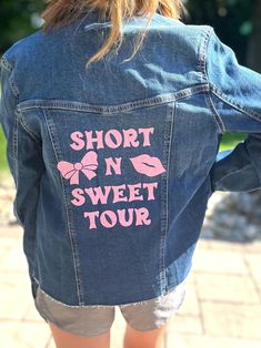 the back of a woman's jean jacket that says, short n sweet tour