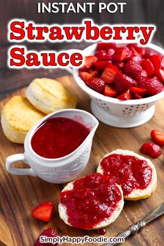 strawberry sauce in a small white bowl next to bread on a cutting board with strawberries