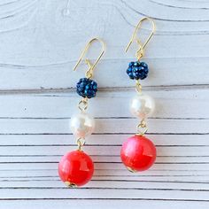 Triple bead drop earrings in red white and blue. A show-stopping set of sparkling patriotic earrings perfect to complete your red and white and blue style on Memorial Day, 4th of July, Veteran's Day, Flag Day or any other day! Thanks for looking! Patriotic Multicolor Dangle Jewelry, Patriotic Drop Earrings For 4th Of July, Patriotic Blue Dangle Jewelry, Red Dangle Earrings For 4th Of July, Red Dangle Jewelry For 4th Of July, Patriotic Blue Drop Earrings, Blue Patriotic Drop Earrings, Patriotic Red Drop Earrings, Red Beaded Earrings For 4th Of July