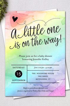 a little one is on the way baby shower card with watercolor background and hearts