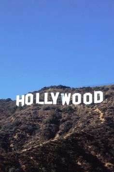 the hollywood sign is on top of a mountain