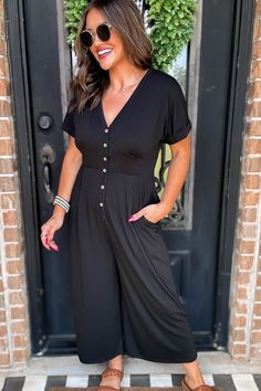 This Steady As We Go Beige Short Sleeve Button Up Jumpsuit is ultra-comfy! It's stretchy, soft fabric will make you want to wear it from morning ‘til night. The button front and wide leg design ensure you'll have a great fit - whether you’re loitering in the living room or out on the town! Fit: She is wearing her true size medium. Fits true to size. If in between sizes, size down Model: Alexis (@alexisappling) Denim: Size 7/28 Dresses: Medium Tops: Medium Bottoms: Medium Height: 5 ft, 4 in Shoe Black Button-up Jumpsuit For Work, Button Up Jumpsuit, Black Fitted Button-up Jumpsuits And Rompers, Relaxed Fit Button-up Jumpsuits And Rompers With Pockets, Medium Wash Button-up Jumpsuits And Rompers With Pockets, Beach-ready Short Sleeve Jumpsuits With Button Closure, Tank Romper, Spring Staples, Beige Shorts