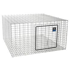 a large metal cage with a blue tag on the front and bottom part, it is empty