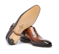 Elegant Cognac Monk Strap Business Shoes, Elegant Cognac Monk Strap Shoes For Business, Elegant Brown Monk Strap Shoes With Rubber Sole, Elegant Cognac Monk Strap Shoes For Formal Occasions, Classic Brown Monk Strap Shoes With Rubber Sole, Elegant Calf Leather Shoes With Buckle Closure, Classic Brown Monk Strap Shoes With Leather Sole, Formal Cognac Monk Strap Shoes With Leather Lining, Brown Leather-lined Monk Strap Shoes For Business