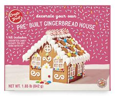 an advertisement for a gingerbread house with sprinkles on the roof and side