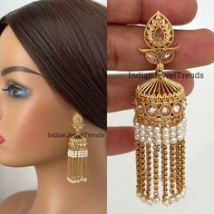 Long Gold Plated Polki Jhumka/Polki stone Jhumka/Indian Jewelry/Pakistani/Punjabi/Indian/Statement earring/Bridal earring/Indian wedding Antique Jhumkis With Gold Plating Height = 75 mm || Width = 28 mm Trendy Design Antique Earring Lightweight and elegant Can be paired with any dress Closure: Pushback This is 100% Handmade jewelry. So Color, shades, texture displayed may slightly vary from the actual product due to digital image limitations. We request you to consider these minor variations. Pl Temple Jewelry Danglers With Latkans For Wedding, Dangle Jhumkas With Latkans For Weddings, Dangle Latkan Jhumkas For Weddings, Wedding Dangle Jhumkas With Latkans, Traditional Wedding Jhumkas With Latkans, Wedding Temple Jewelry Danglers With Cutdana, Heavy Dangle Jhumkas For Diwali, Temple Jewelry Danglers For Diwali Weddings, Heavy Jhumkas For Wedding Festivals