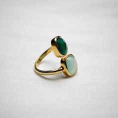 D E T A I L S - Material: Sterling Silver Stone: Aqua chalcedony & Green Chalcedony The fit: True to US ring size Finish: Smooth and gold-filled to a high shine Upgrade your accessory collection today with this must-have piece, & flaunt your style statement S H I P P I N G & P R O D U C T I O N - My current production time is 2-6 business days, which means after those days are up, your order ships! I make everything custom to order, by hand, but I promise you it's worth the wait! R U Adjustable Chalcedony Jewelry For Anniversary, Green Chalcedony Gemstone Rings, Modern Chalcedony Rings For Gift, Green Onyx Gemstone Rings As Gift, Faceted Rings For May Birthstone Gifts, Faceted Rings For Gifts, May Birthstone, Elegant Chalcedony Rings For Gift, Faceted Ring Gift For May Birthstone, Adjustable Open Emerald Ring For Wedding