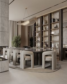 an elegant dining room with marble tables and chairs