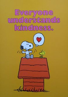 a cartoon dog on top of a table with a balloon saying everyone understands kind of kindness