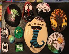 painted rocks with different designs on them and saying if the shoe fits, it's halloween