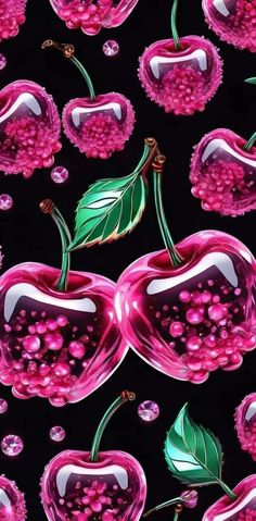 pink cherries on black background with green leaves and bubbles in the shape of hearts