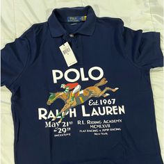 An American Style Standard Since 1972, The Polo Shirt Has Been Imitated, But Never Matched. Over The Decades, Ralph Lauren Has Reimagined His Signature Style In A Wide Array Of Colors And Fits, Yet All Retain The Quality And Attention To Detail Of The Iconic Original. This Relaxed Version Features A Poster-Style Equestrian Graphic Classic Fitted Polo Shirt With Graphic Print, Luxury Casual Ralph Lauren Polo Shirt, Polo Shirt Outfit Men, Blue Ralph Lauren Polo Shirt, Graphic Clothes, Men's Equestrian, Classic Collared Ralph Lauren T-shirt, Ralph Lauren Graphic Print T-shirt, Ralph Lauren Fitted Polo T-shirt