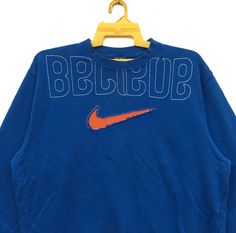 PLEASE ASK ANY QUESTION BEFORE BUYING THIS IS USED CLOTHING PLEASE DONT EXPECTED IT TO BE LIKE NEW OR IN PRISTINE CONDITION Rare!! Nike Swoosh Sweatshirts Big Logo Blue Embroidered Sweater tag nike material cotton 100% saiz on tag XL (large) Mesasures About ( Approximately) -Armpit to Ampit : 24 inch -Length (back collar down) : 26 inch Condition : used good condition 8/10 **No Tears No Stains And No Hole** 🎈PLEASE READ THE DESCRIPTION AND POLICY BEFORE BUYING 🎈ACCEPT PAYMENT: PAYPAL ONLY ALL Embroidered Sweater, Nike Swoosh, A Bathing Ape, Fashion Logo, Streetwear Outfit, Used Clothing, Long Sweatshirt, Sweater Sizes, Vintage Outfits