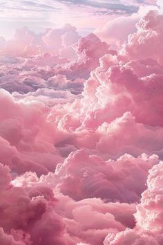 the sky is filled with pink clouds