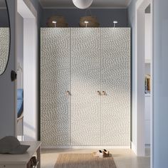 a walk in shower sitting inside of a bathroom