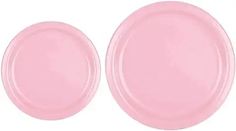 two pink plates sitting next to each other