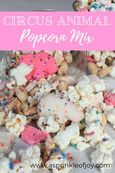 an animal popcorn mix with sprinkles and pink frosting in the middle