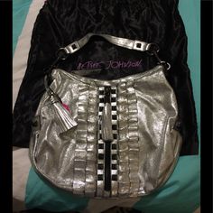 % Leather Metallic Silver Studded Like New 15 /L X 12 /W Inches No Returns Silver Leather Bag With Rhinestones, Silver Satchel With Silver-tone Hardware, Betsy Johnson Purses, Betsey Johnson Skull Bag, Skull Handbags Betsey Johnson, Red Crossbody Bag With Silver-tone Hardware, Betsey Johnson Bags, Betsy Johnson, Silver Studs