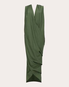 a green dress that is draped over and has an open back, asymmetrically shaped