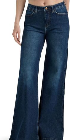 About this item REGULAR FIT. Add a little flair to your denim with our Women's Wide Leg Flare Jean. It's designed with a flattering high-rise waist, a wide leg and a full length. Inseam: 32". YOUR NEW FAVORITE JEANS. Combining comfort, quality and authentic Wrangler style, these high-waisted jeans are always a reliable choice. Pair them with your favorite t-shirt, jacket, or cropped tank to complete the look. STRETCH COMFORT. These jeans for women are crafted from a cotton blend with just a hint of stretch to keep you comfortable no matter what's on the agenda. FIVE POCKET STYLING. This jean is constructed with authentic 5 pocket styling: (1) watch pocket, (2) front scoop pockets, (2) back spade pockets. Pocket Embroidery Design, Back Pocket Embroidery, Wrangler Pants, Pocket Embroidery, Jeans Pant, Watch Pocket, Jeans For Women, Wide Pants, Back Pocket