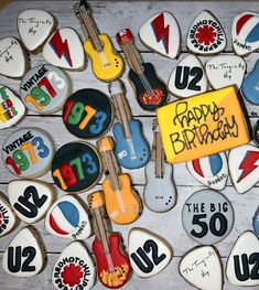 decorated birthday cookies with guitars and numbers on them