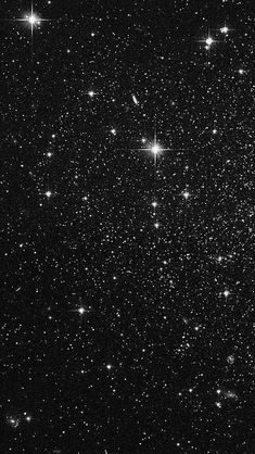 stars in the night sky with black and white background