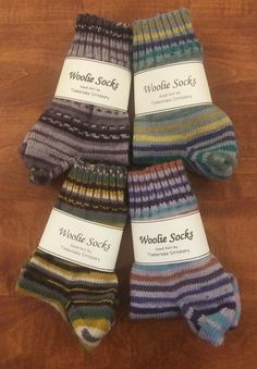 Hand knit wool crew socks fit women's shoe size 7-9 and men's shoe size 7-8.  Available in either a jacquard or stripe pattern.  These socks are warm, cozy, and have a non binding cuff.  Your feet will be toasty no matter what the winter weather brings your way!  Patterns may vary slightly from those pictured due to the unique nature of the yarn.  Made of 75% washable wool and 25% nylon yarn.   Machine wash in cold water.  Machine dry low heat. Knit in a smoke free and pet friendly home. ** The beautiful sock blockers displayed in the photos can be found at the Etsy shop aneedlerunsthroughit #aneedlerunsthroughit. Hand Knit Striped Socks, Striped Socks For Winter Stocking Stuffer, Striped Socks For Stocking Stuffers In Winter, Wool Socks Pattern, Sock Blockers, Knit Wool Socks, Womens Socks, Hand Knit Socks, Water Machine