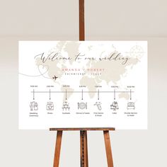 an easel with a map on it and the words, welcome to our wedding