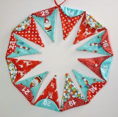 an ornament made out of red and blue fabric