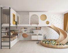 a room with a spiral staircase in the center and lots of balls on the floor