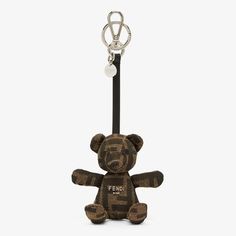 Teddy bear-shaped key ring. Snap clip and logo ring. Made of brown FF jacquard and embellished with brown leather details. Fendi Roma lettering and palladium-finish metalware. Made in Italy. One Size Ring Snap, Fragrance Gift, Clutch Pouch, Boot Accessories, Women Essentials, Beachwear For Women, Ski Wear, Key Ring, Key Rings