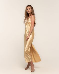 Introducing the Soulful Long Silky Dress with Slit, a classic dress crafted for warm summer nights out. Made from a luxurious silk and satin blend, this dress exudes elegance and sophistication.   ✓ garment length - 145 cm/57'' ✓ cross back ✓ side slit ✓ shoulder straps with length regulation.  Material Composition: polyamide 60%, viscose 20%, polyester 10%, silk 7%, elastane 3%. Model is 175 cm/67.6'' tall and wears size S. Ball Gown Gold, Champagne Satin Dress, Gold Slip Dress, Old Hollywood Dress, Floral Evening Dresses, Hollywood Dress, Long Nightgown, Long Slip Dress, Bias Cut Dress